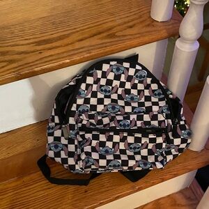Stylish Black and White Checkered Stitch Backpack
